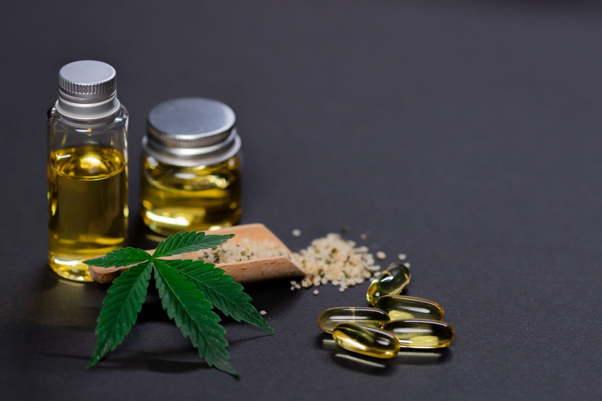 Assorted botanical ingredients and aromatic spices in ceramic bowls representing cannabis terpene-rich concentrates and extracts