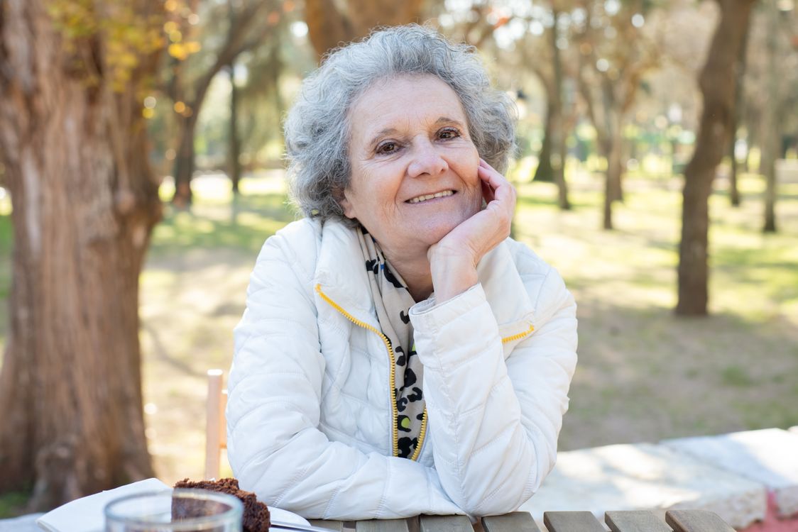 Healthy elderly woman outdoors in sunlight representing senior cannabis use and wellbeing in Australia
