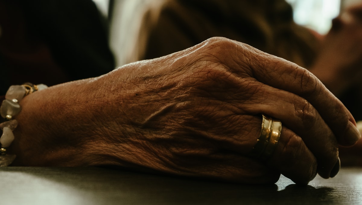 Close-up of resting hands representing Parkinson's disease patients exploring medicinal cannabis for tremor, rigidity and non-motor symptom relief in Australia